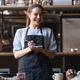 waitress laughing at table with customers